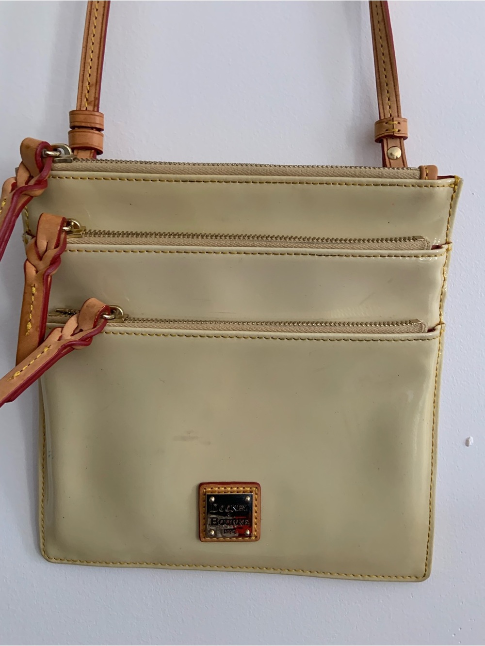 Dooney & Bourke Cream patent Leather Crossbody Bag